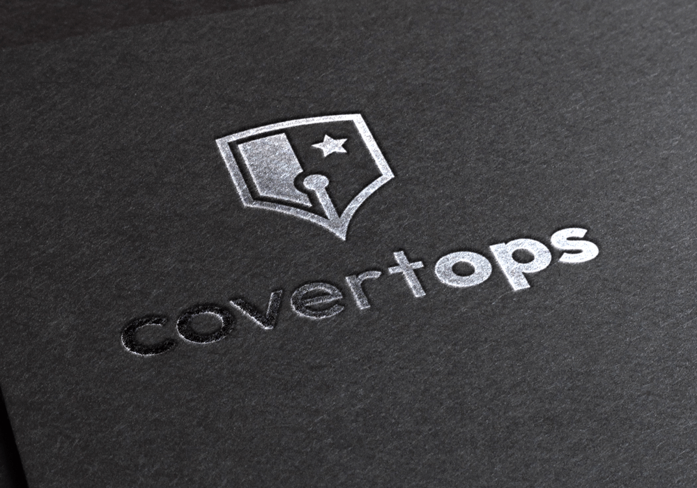 Covert Ops logo sliver on black paper