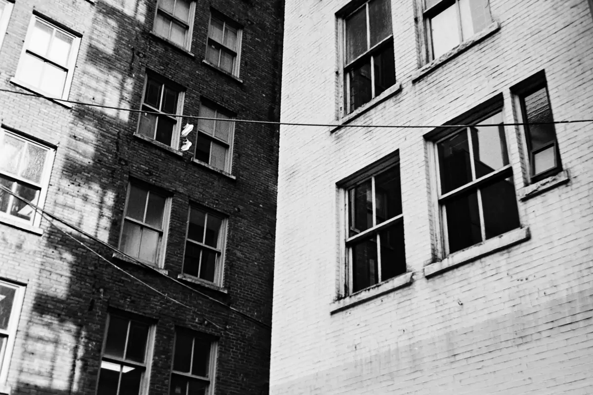 Contrast between 2 walls in street Analog Photography