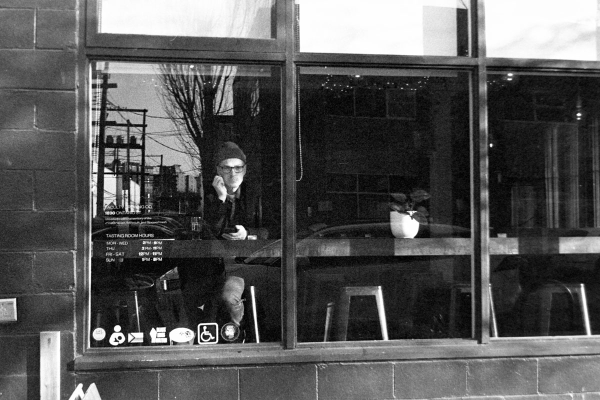 Man looking through the window
